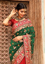 Maroon Heavy Soft Silk Wedding Saree with Green Embroidered Border – Kalash Collection