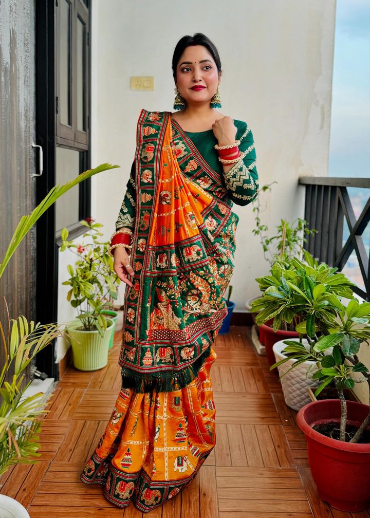 Royal Mustard Orange Yellow Silk Blend Saree with Emerald Green Patola Embroidery and Ornate Tassel Pallu