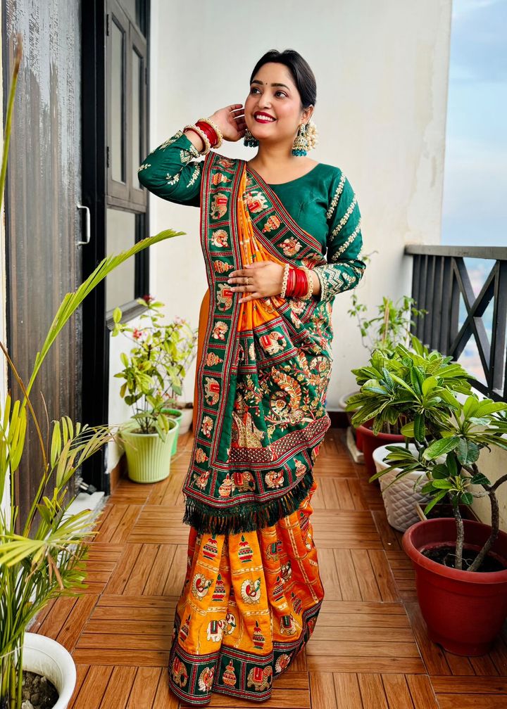 Royal Mustard Orange Yellow Silk Blend Saree with Emerald Green Patola Embroidery and Ornate Tassel Pallu