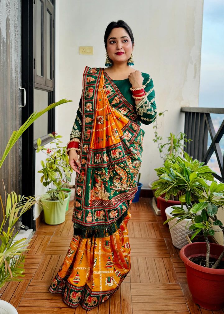 Royal Mustard Orange Yellow Silk Blend Saree with Emerald Green Patola Embroidery and Ornate Tassel Pallu