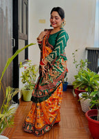 Royal Mustard Orange Yellow Silk Blend Saree with Emerald Green Patola Embroidery and Ornate Tassel Pallu