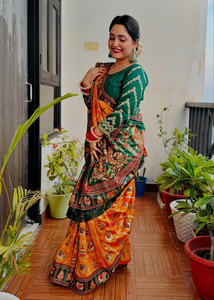 Royal Mustard Orange Yellow Silk Blend Saree with Emerald Green Patola Embroidery and Ornate Tassel Pallu