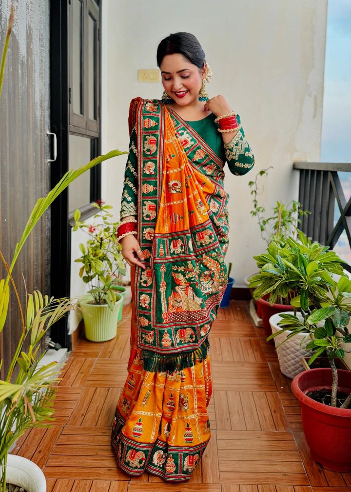 Royal Mustard Orange Yellow Silk Blend Saree with Emerald Green Patola Embroidery and Ornate Tassel Pallu