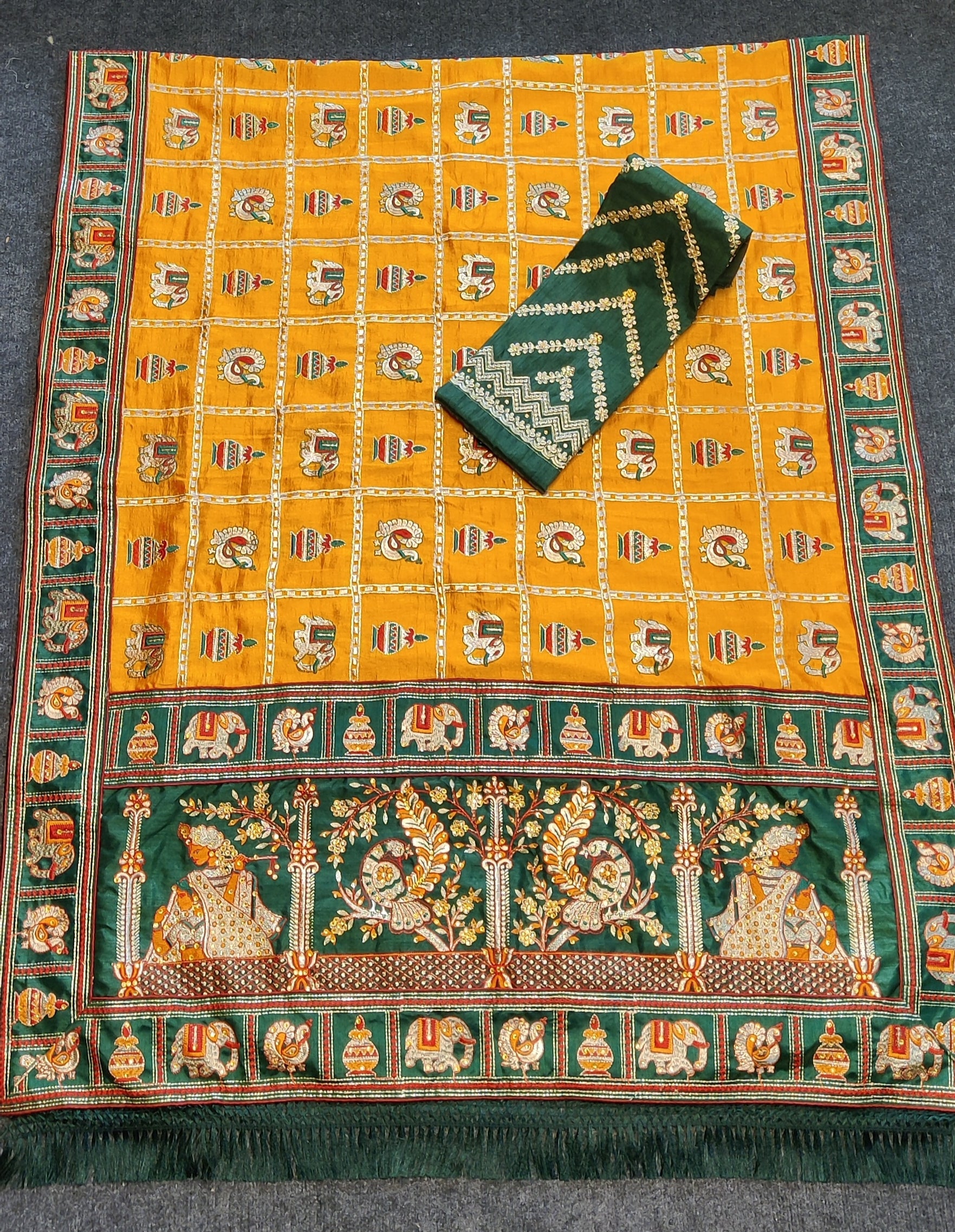 Royal Mustard Orange Yellow Silk Blend Saree with Emerald Green Patola Embroidery and Ornate Tassel Pallu