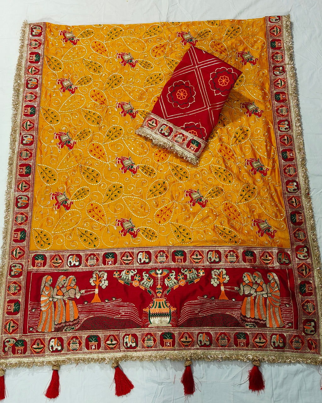 Tulsi Vat Savitri Special: Orange Yellow Vichitra Silk Saree with Narrative Embroidery & Latkan Tassels