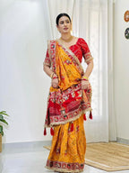 Tulsi Vat Savitri Special: Orange Yellow Vichitra Silk Saree with Narrative Embroidery & Latkan Tassels