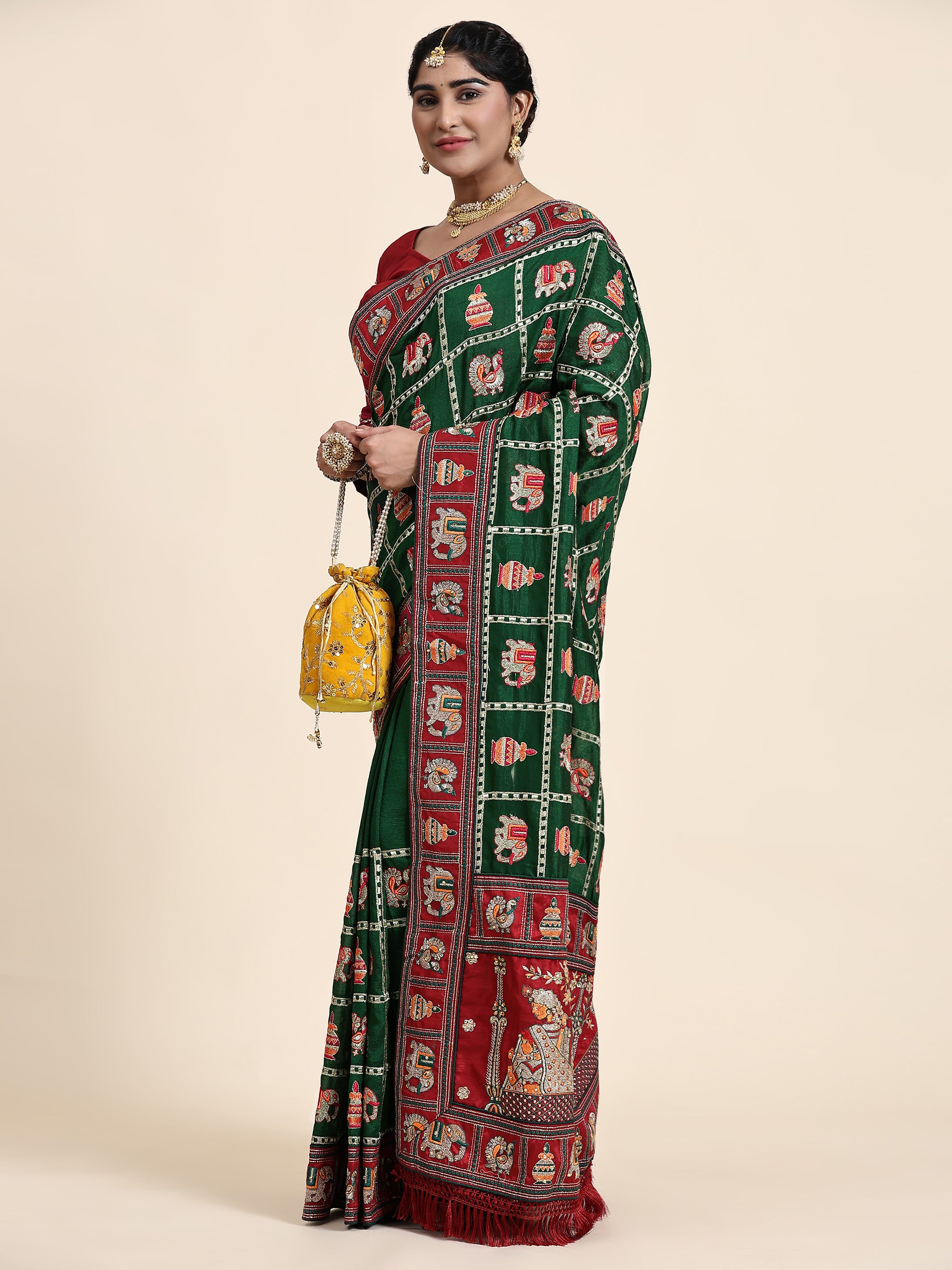 Heritage Green & Maroon Silk Blend Saree with Traditional Patola-Style Embroidery and Tassel Detail