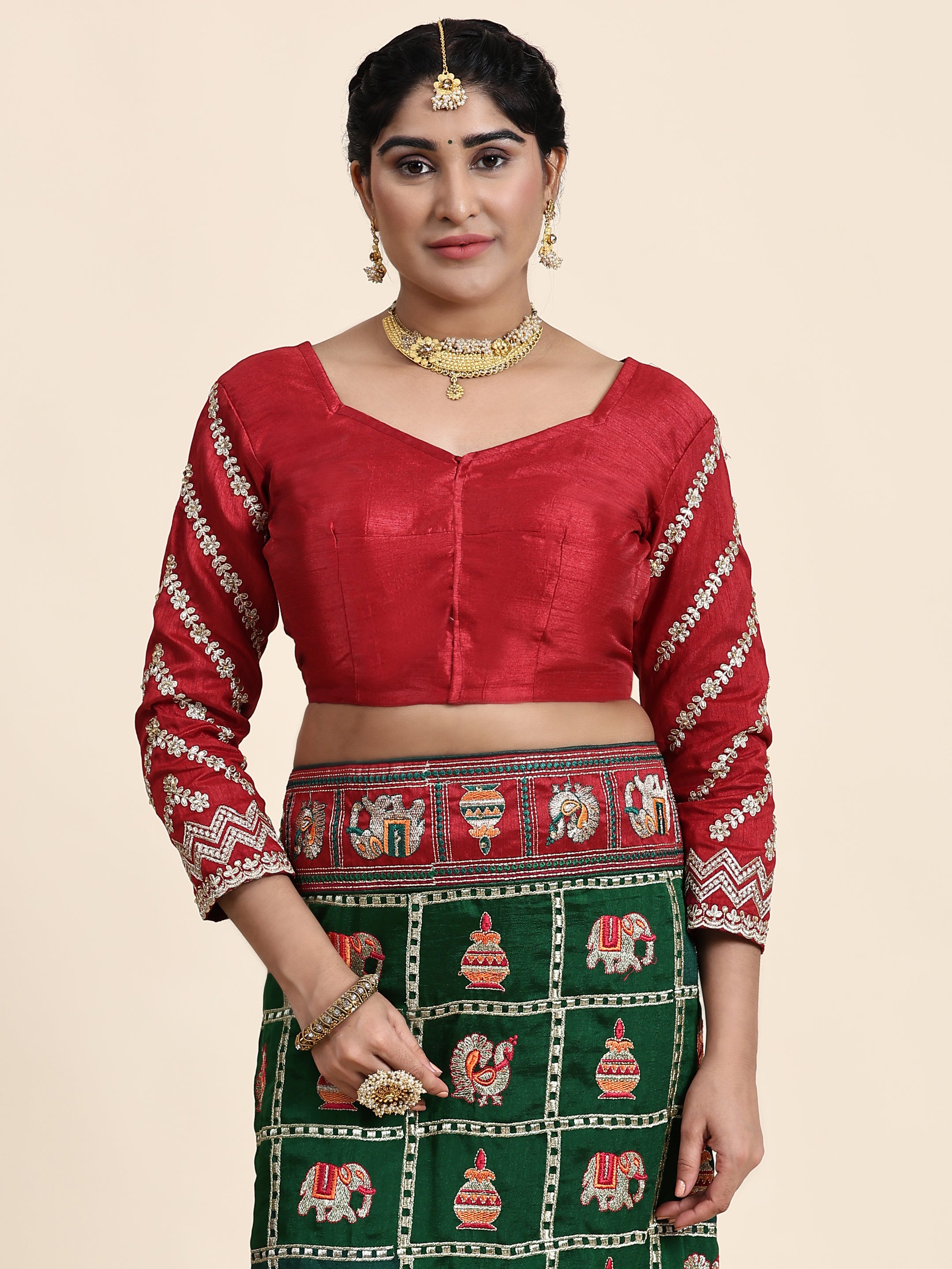 Heritage Green & Maroon Silk Blend Saree with Traditional Patola-Style Embroidery and Tassel Detail