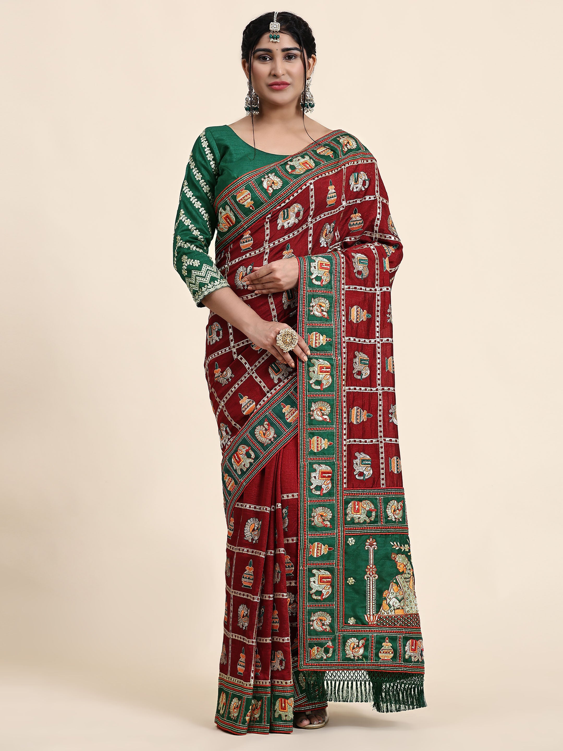 KAIRA Elegant Maroon & Green Silk Blend Saree with Heritage Patola Motifs and Rich Embroidered Pallu
