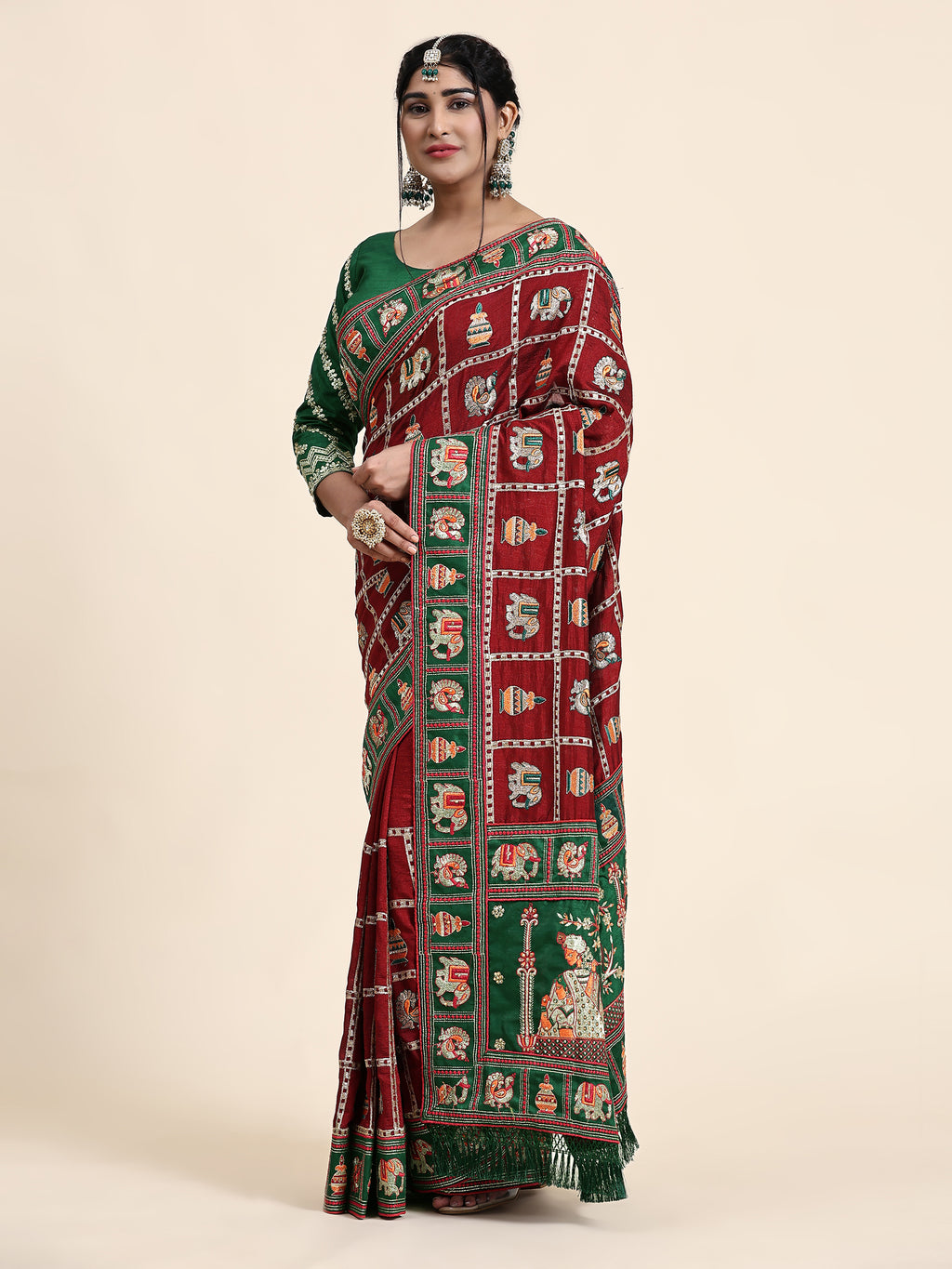 KAIRA Elegant Maroon & Green Silk Blend Saree with Heritage Patola Motifs and Rich Embroidered Pallu