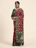 KAIRA Elegant Maroon & Green Silk Blend Saree with Heritage Patola Motifs and Rich Embroidered Pallu