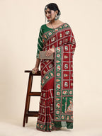 KAIRA Elegant Maroon & Green Silk Blend Saree with Heritage Patola Motifs and Rich Embroidered Pallu