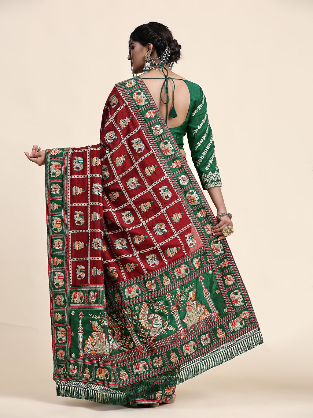 KAIRA Elegant Maroon & Green Silk Blend Saree with Heritage Patola Motifs and Rich Embroidered Pallu