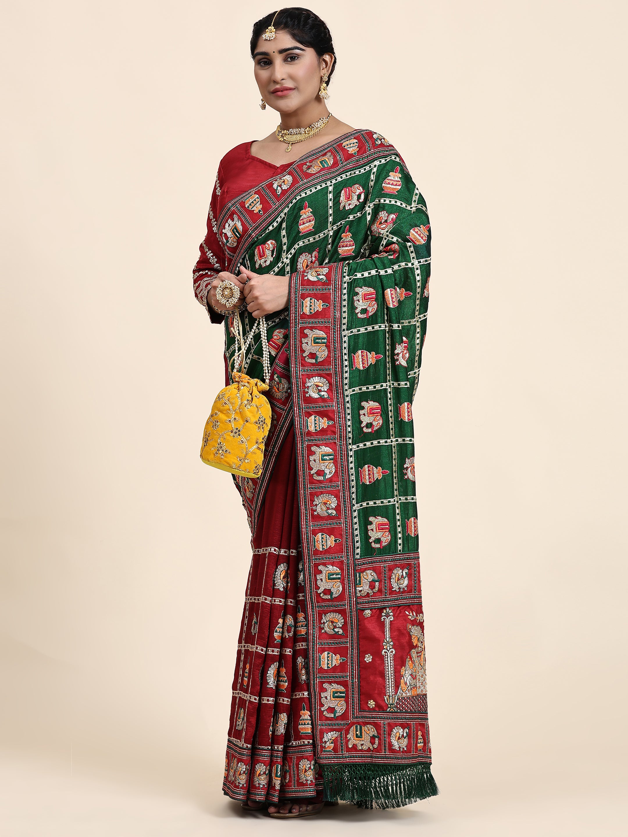 KAIRA-136 Royal Green & Maroon Silk Blend Saree with Traditional Patola Motifs and Heavy Embroidered Pallu
