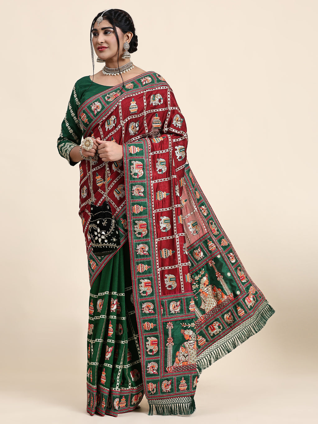 KAIRA-137 Heritage Silk Blend Saree in Royal Maroon & Emerald Green with Traditional Patola Motifs and Ornate Pallu