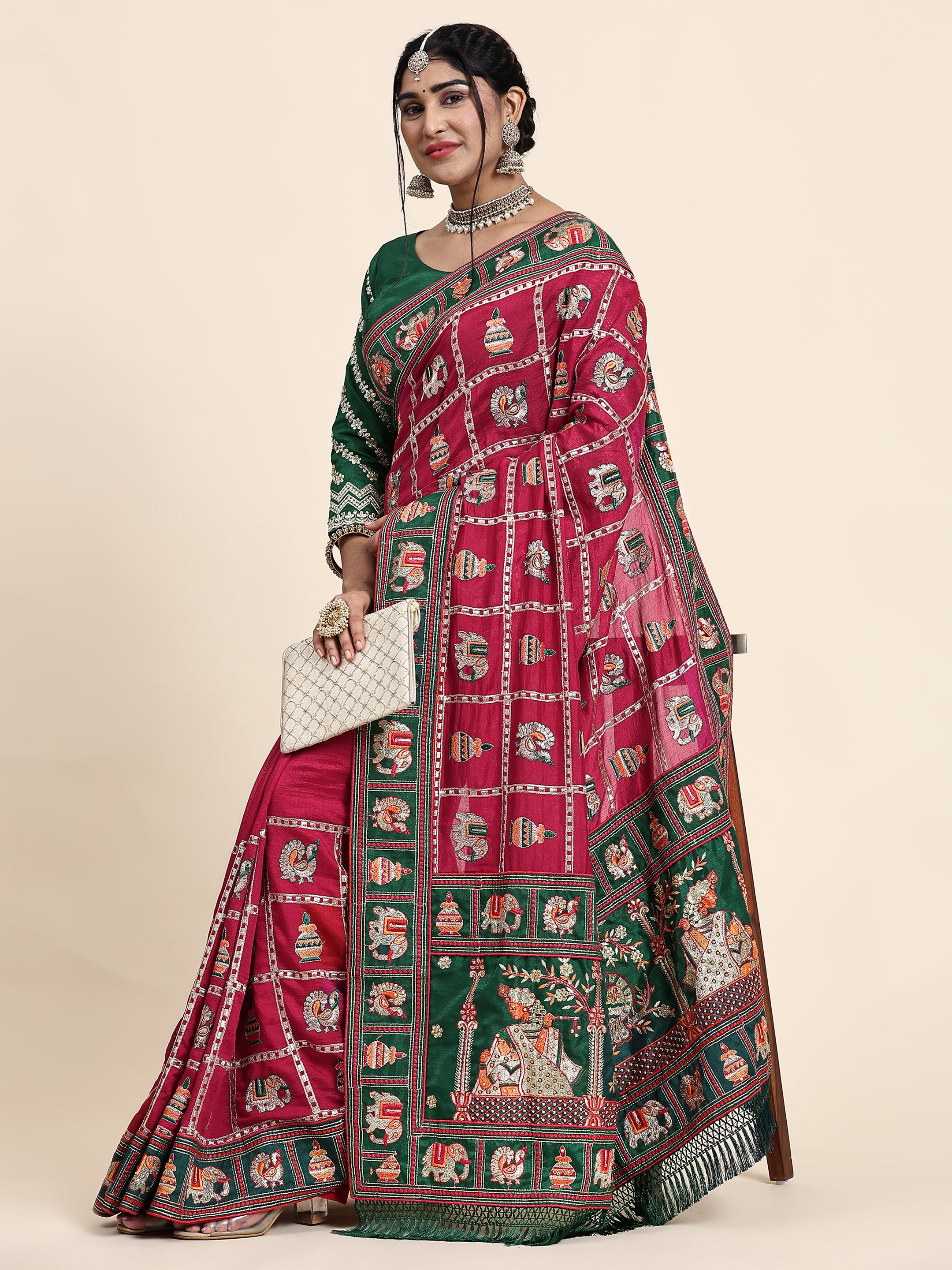 KAIRA-138 Radiant Dark Pink & Emerald Green Silk Blend Saree with Traditional Patola Grid Motifs and Embroidered Tassel Pallu