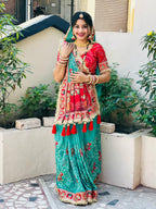 Tulsi Vat Savitri Special: Teal Greenish-Blue Vichitra Silk Saree with Traditional Narrative Embroidery & Tassels