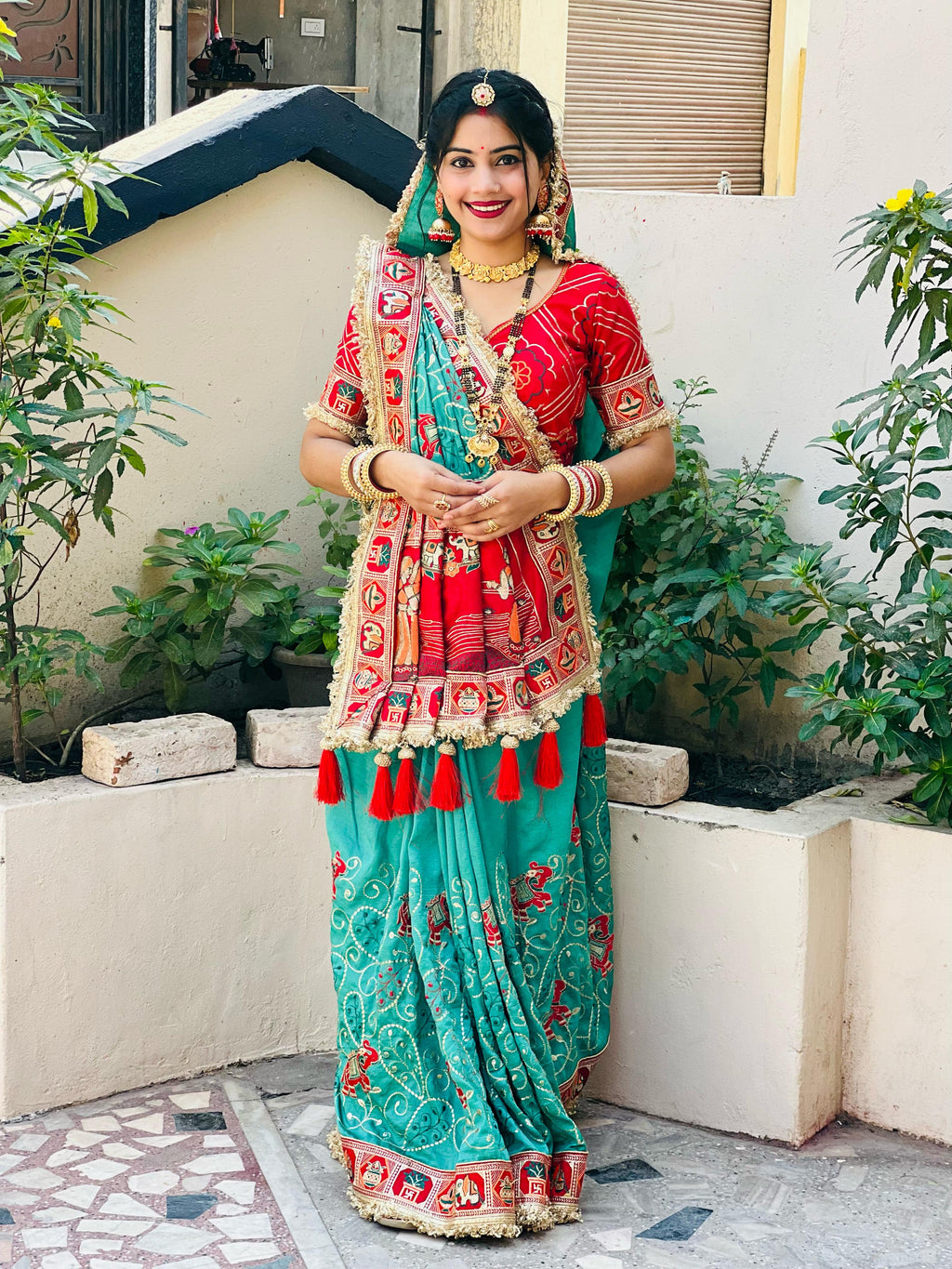 Tulsi Vat Savitri Special: Teal Greenish-Blue Vichitra Silk Saree with Traditional Narrative Embroidery & Tassels