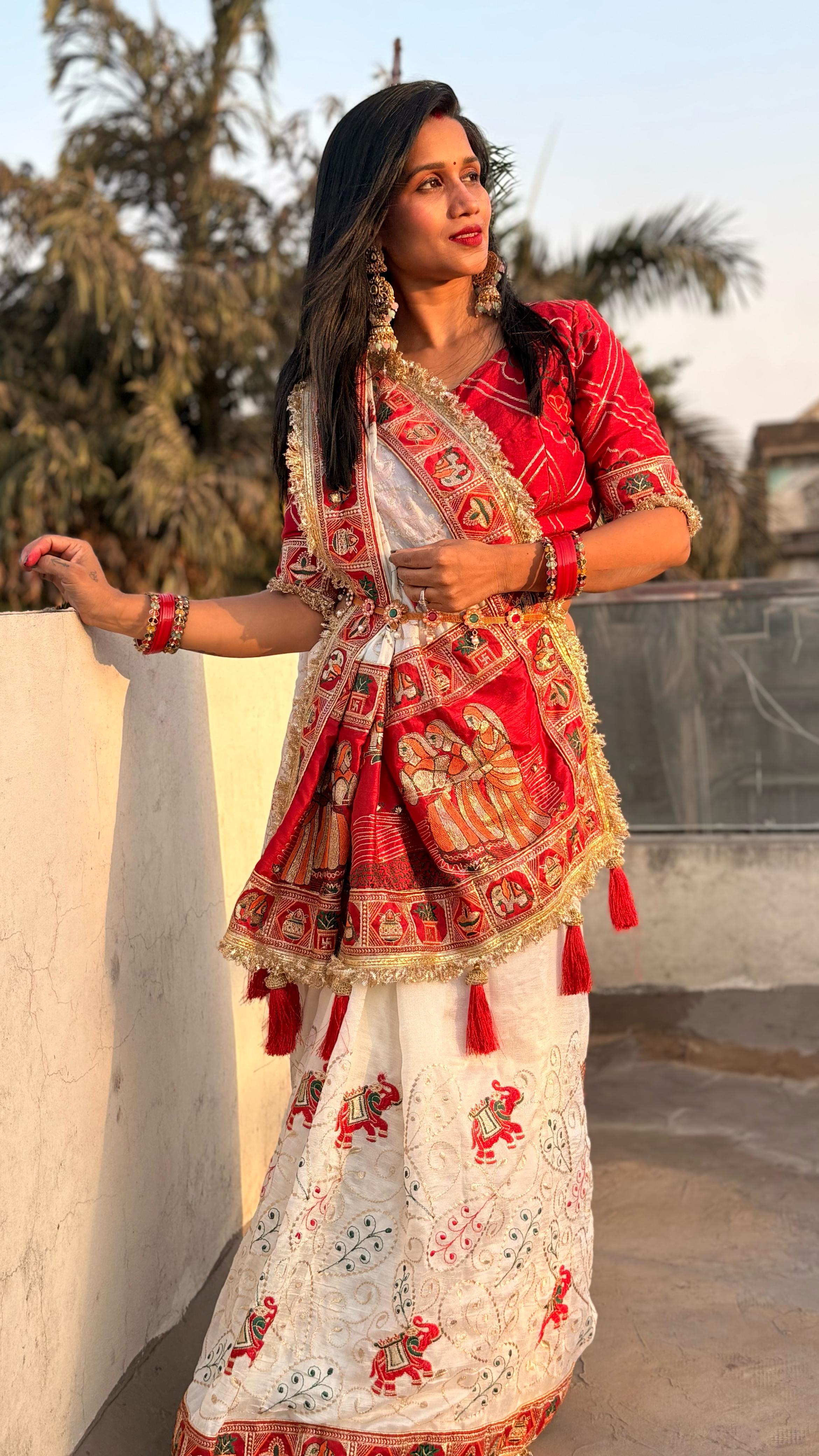 Tulsi Vat Savitri Special: White Heavy Vichitra Silk Saree with Narrative Palla Embroidery, Lace Border & Latkan Tassels