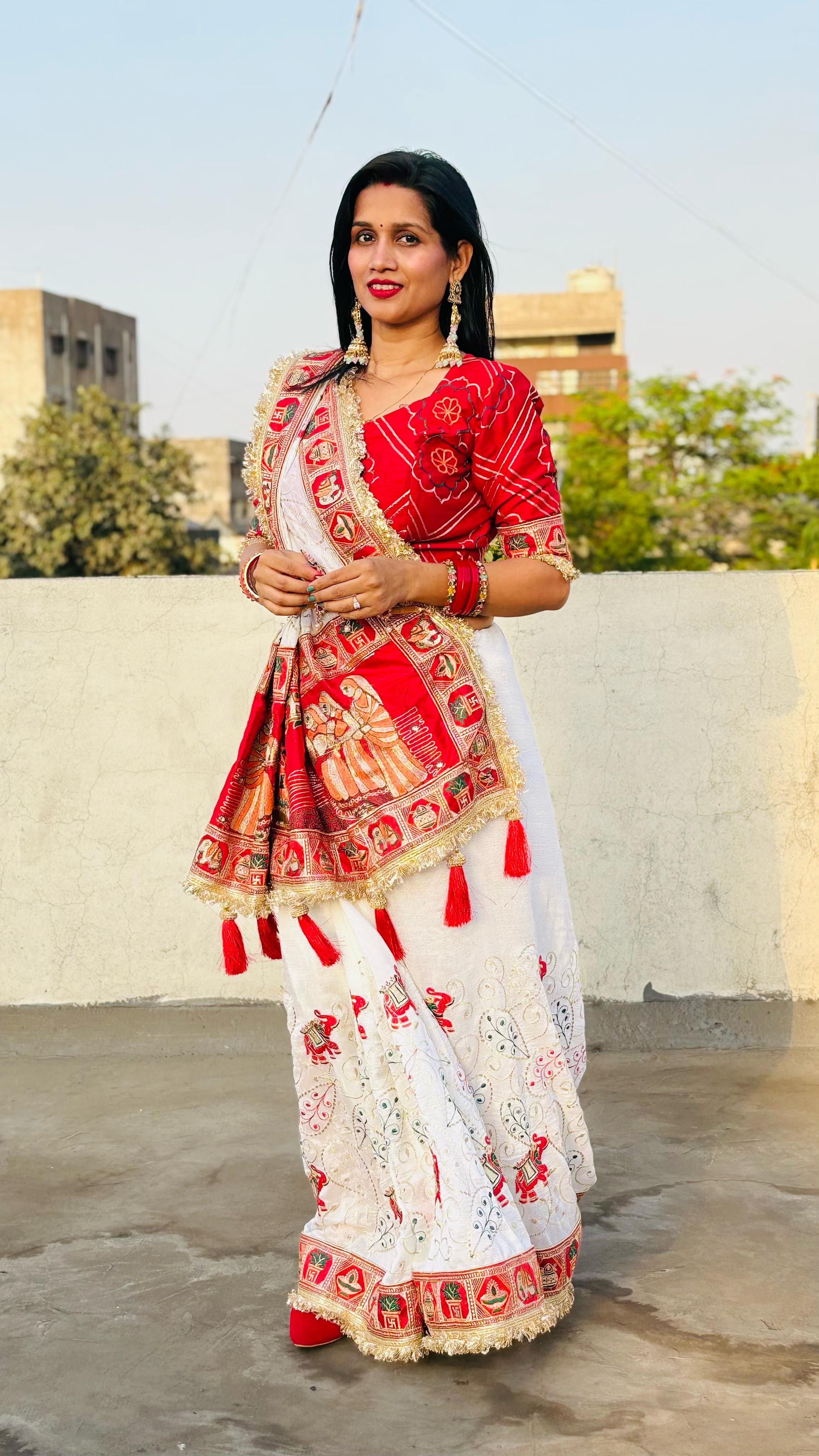 Tulsi Vat Savitri Special: White Heavy Vichitra Silk Saree with Narrative Palla Embroidery, Lace Border & Latkan Tassels