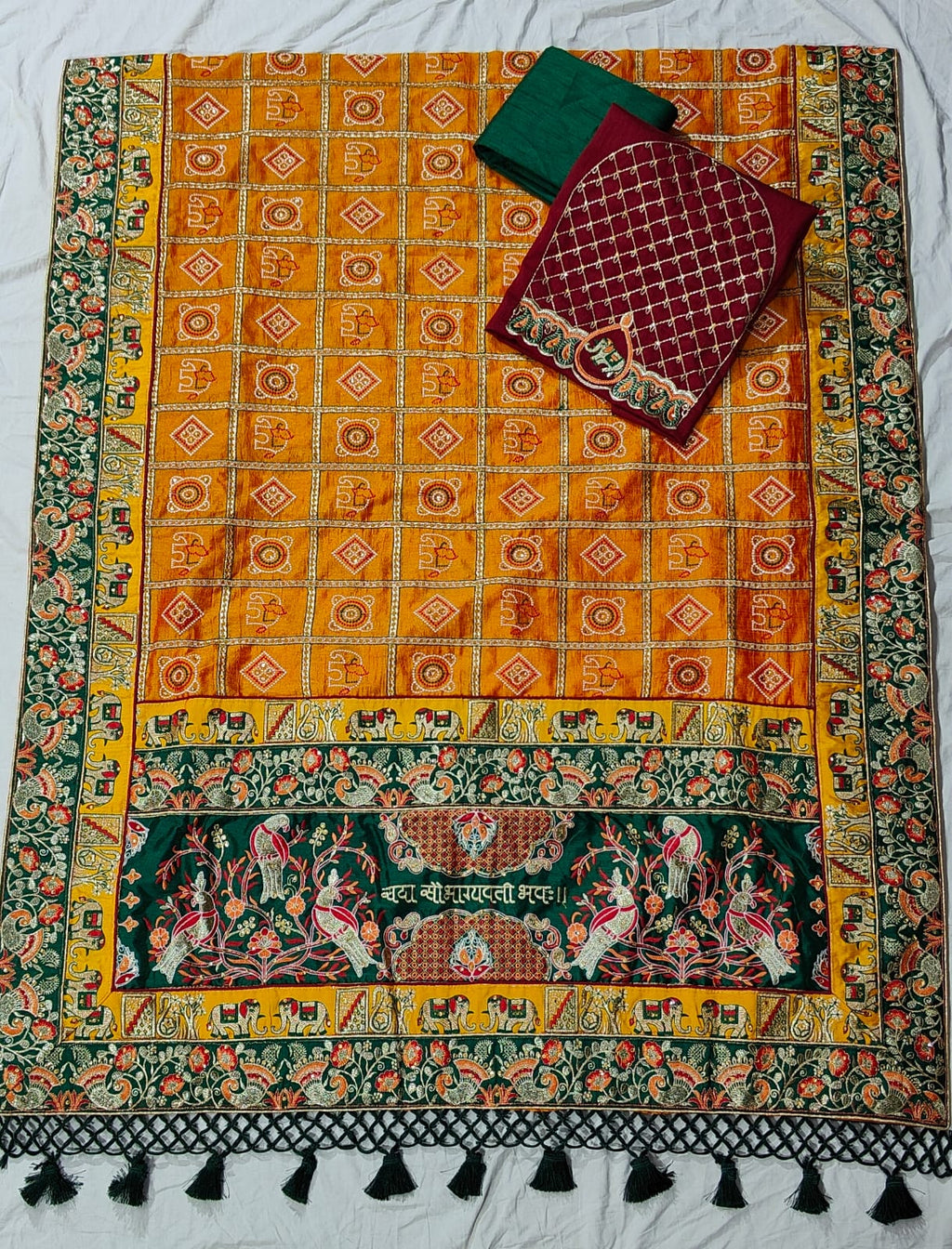 Kusum Sada Saubhagyavati Bhava Wedding Saree – Vibrant Orange-Yellow & Green