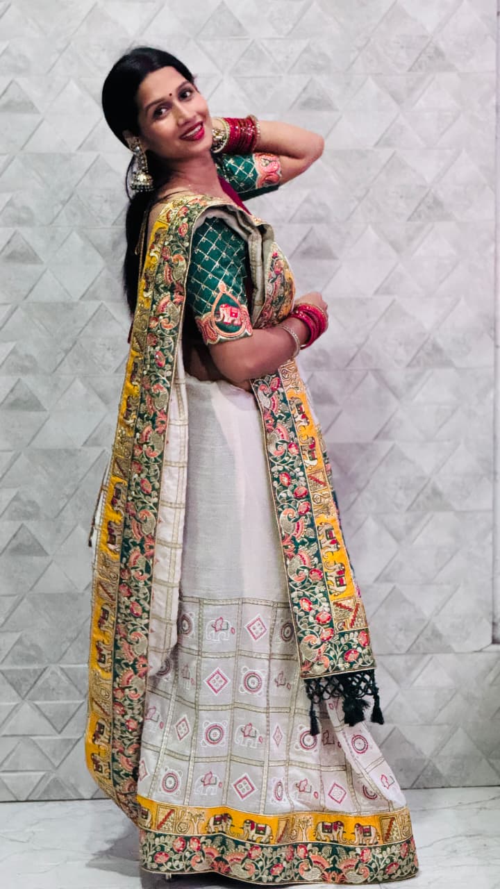 Kusum Premium Soft Silk Off White Green Patola Saree With Saubhagyavati Bhava Border