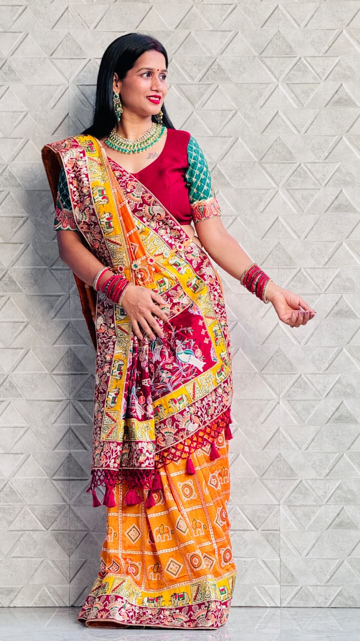 Kusum Sada Saubhagyavati Bhava Wedding Saree – Vibrant Orange-Yellow & Maroon