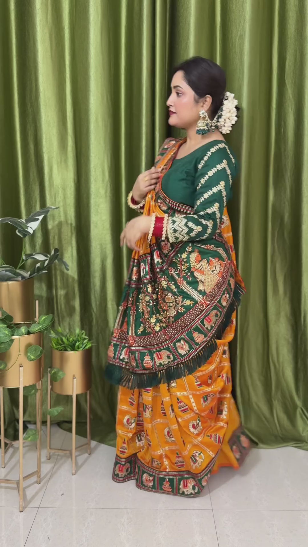 Royal Mustard Orange Yellow Silk Blend Saree with Emerald Green Patola Embroidery and Ornate Tassel Pallu