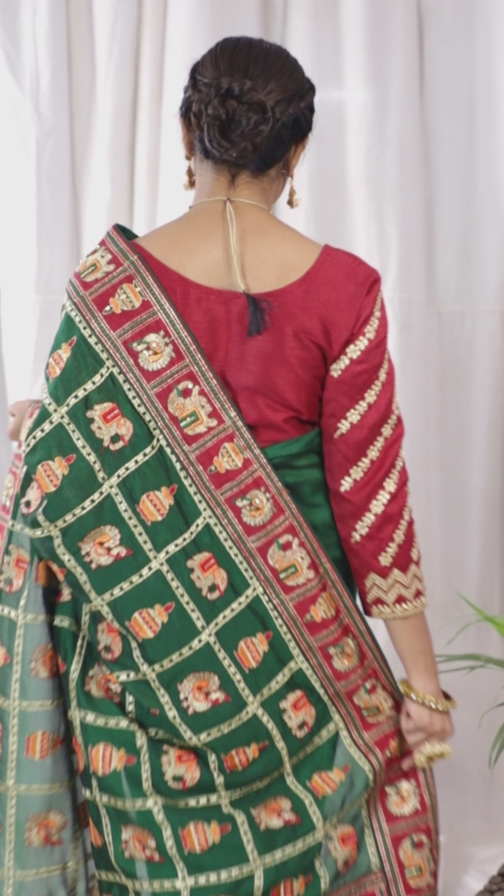 Heritage Green & Maroon Silk Blend Saree with Traditional Patola-Style Embroidery and Tassel Detail